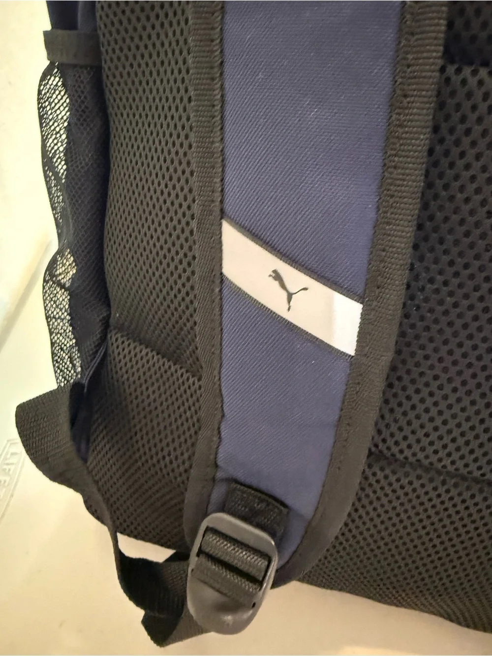 Puma backpack flap